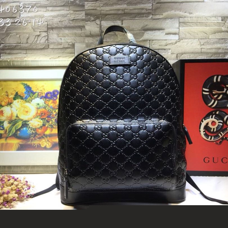G*u*i backpacks